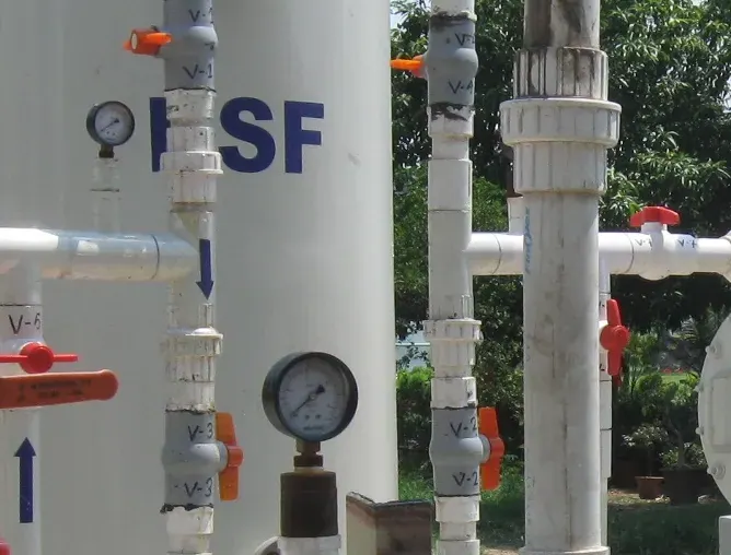 A pressure gauge on a filter vessel's inlet line.